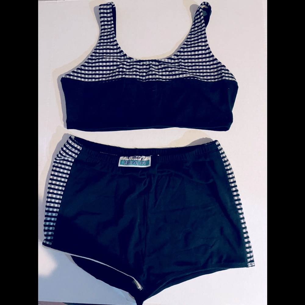 Folley Beach black XL 2 piece swim suit. Used. Worn only a couple of times.